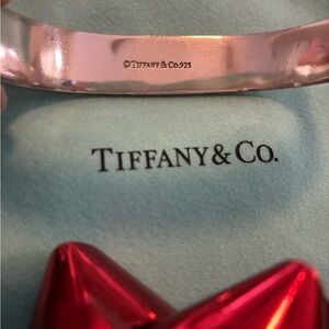 Tiffany & Co. Silver Bangle with Red Bow